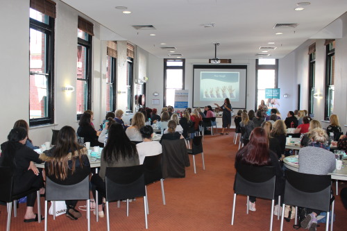 Workshop room full of attendees