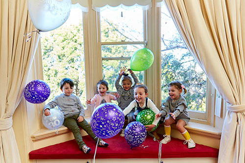 children with balloons